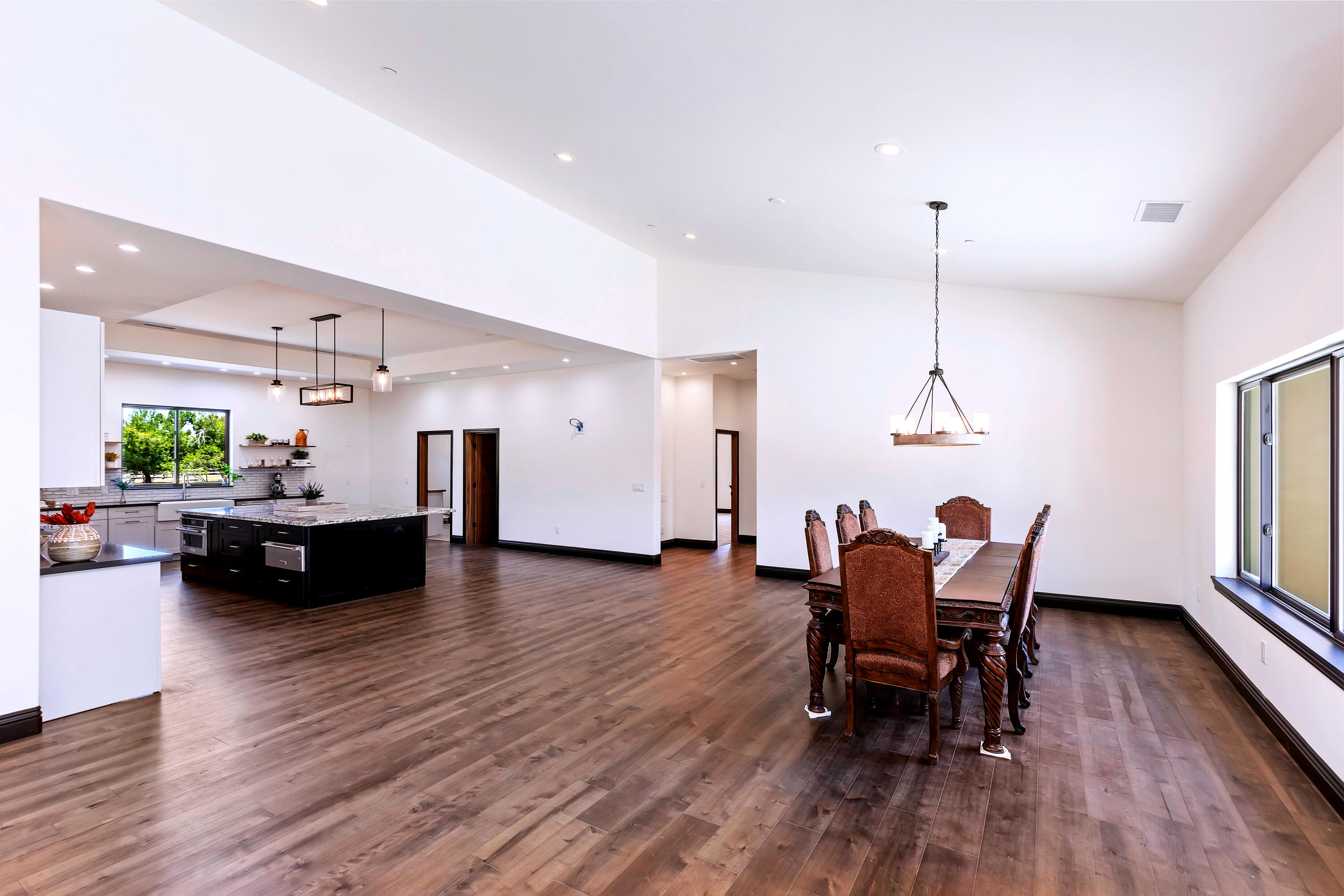 17370 Rodeo Road Lake Elsinore, CA 92530 - Photo 22 of 68 a view of a dining room with furniture window and wooden floor