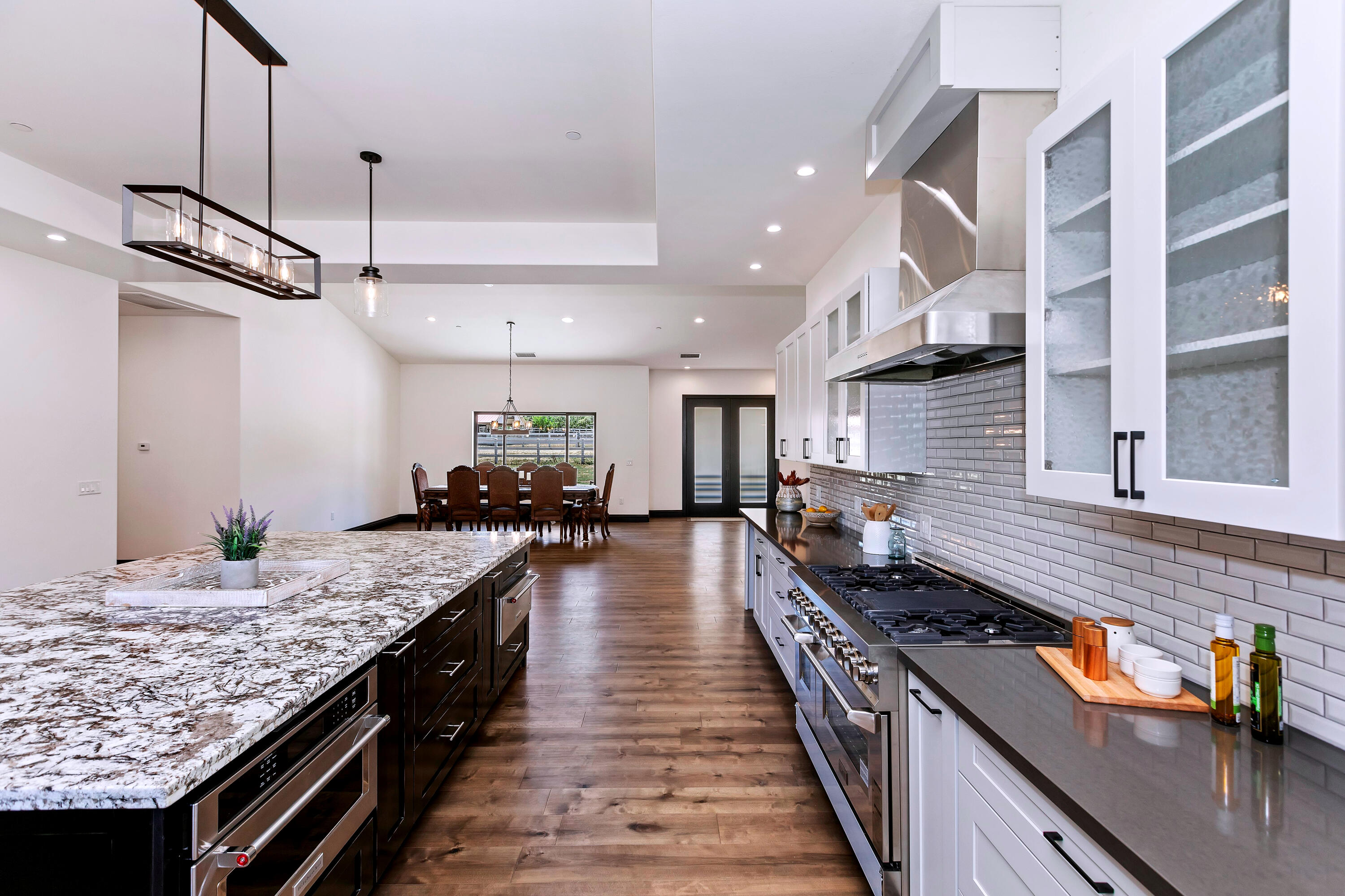 17370 Rodeo Road Lake Elsinore, CA 92530 - Photo 30 of 68 a kitchen with granite countertop lots of counter top space