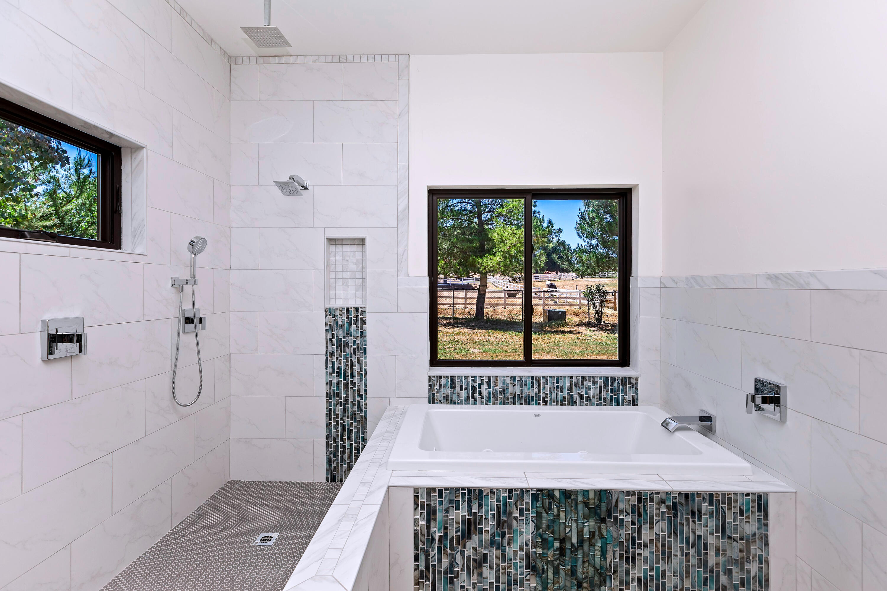 17370 Rodeo Road Lake Elsinore, CA 92530 - Photo 36 of 68 a bathroom with a bathtub and shower
