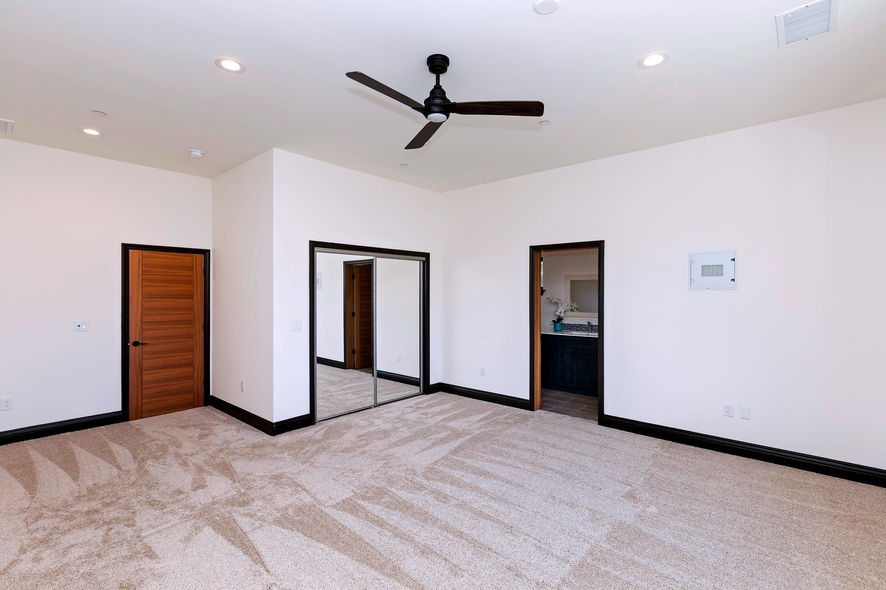 17370 Rodeo Road Lake Elsinore, CA 92530 - Photo 43 of 68 a view of empty room with ceiling fan