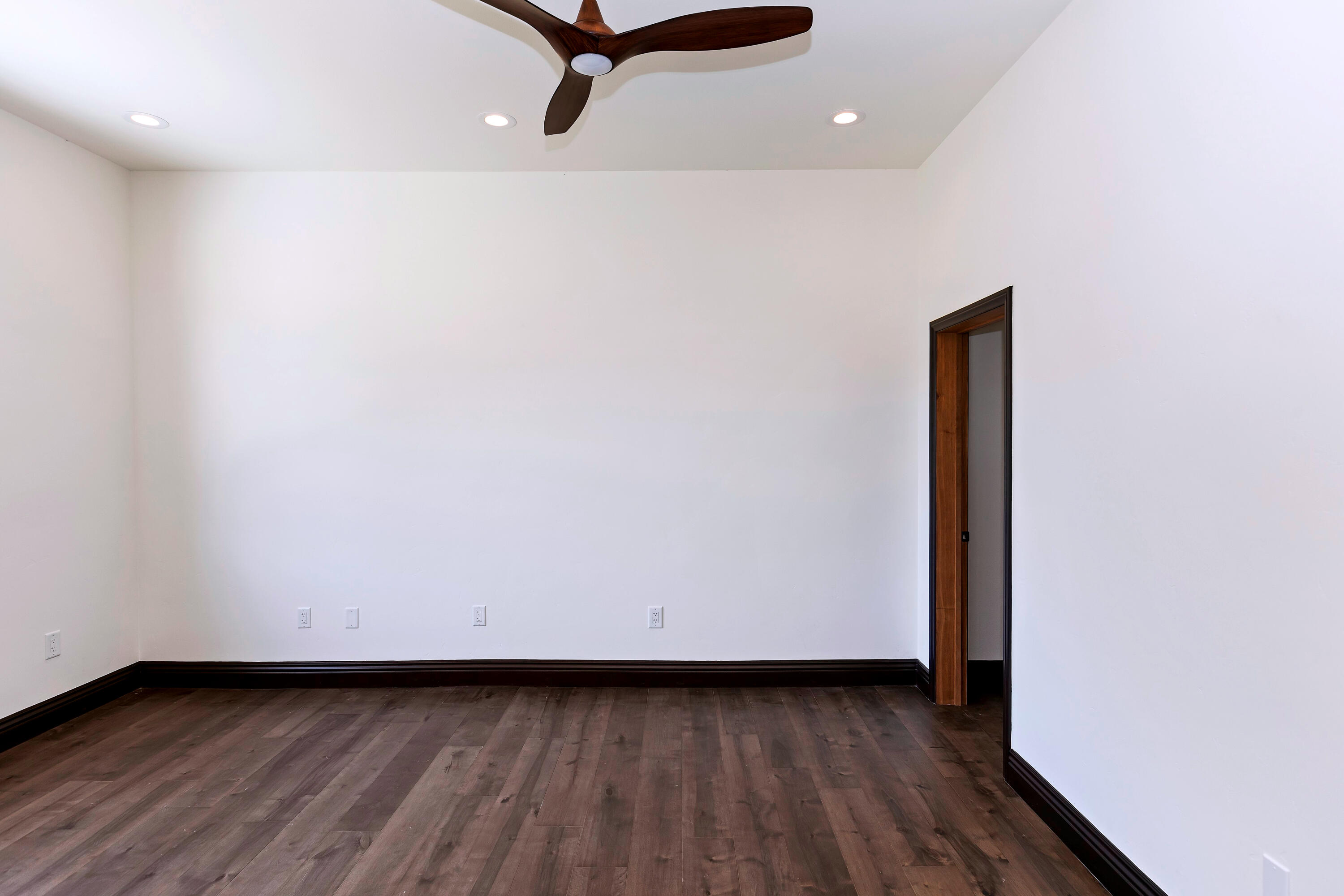 17370 Rodeo Road Lake Elsinore, CA 92530 - Photo 46 of 68 a view of a room with wooden floor