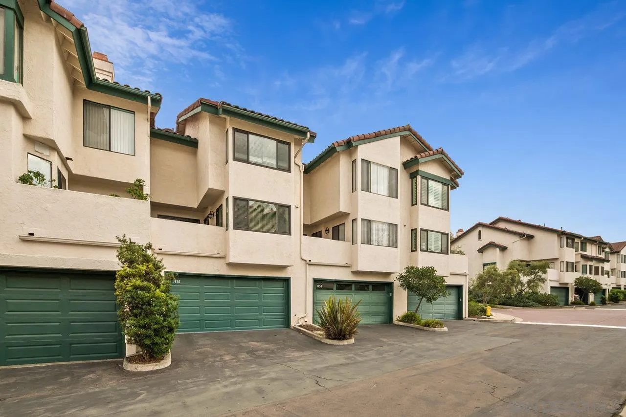 1458 Summit Drive Chula Vista, CA 91910 - Photo 20 of 22 a front view of a house with a garden