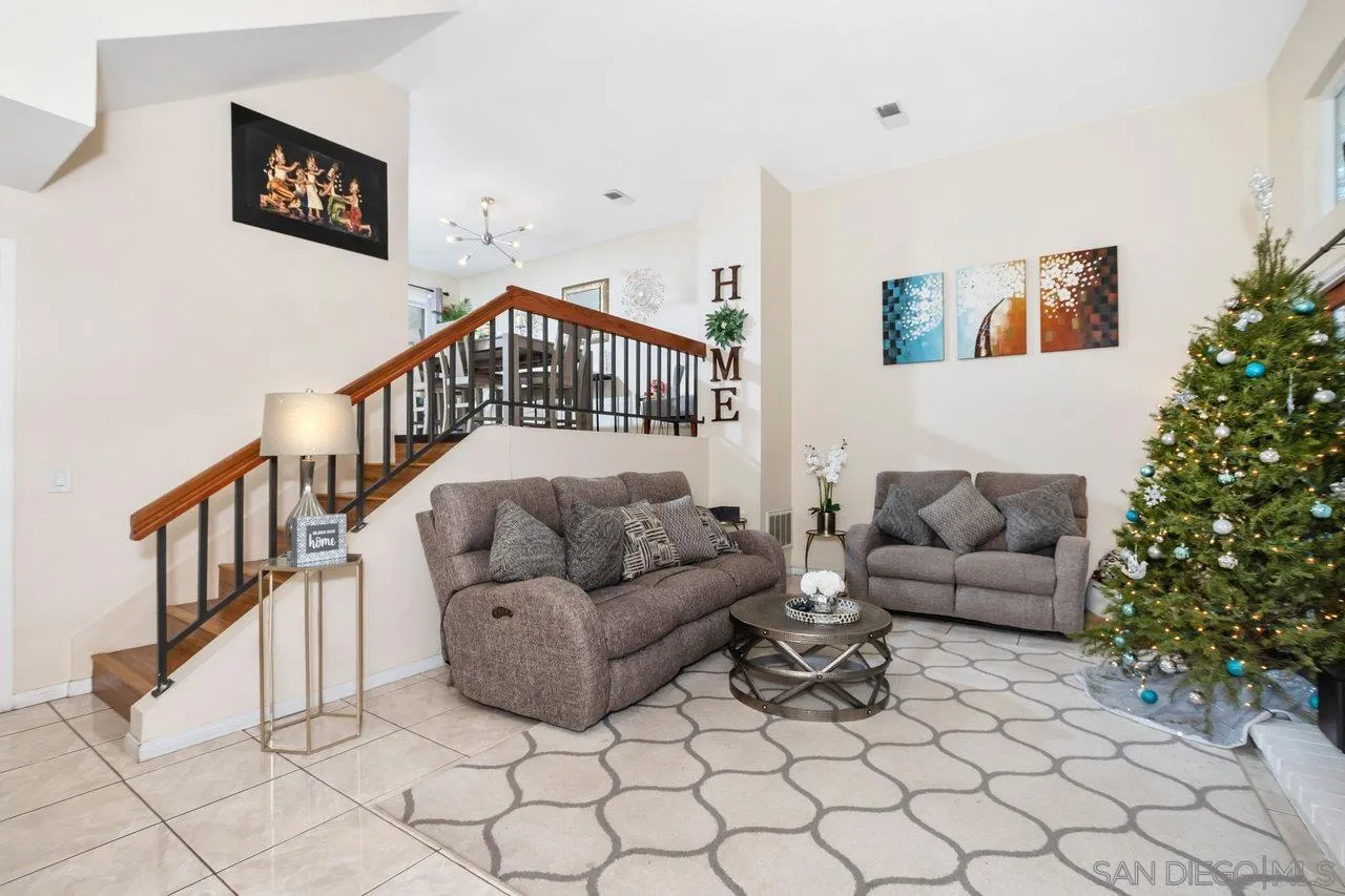 1458 Summit Drive Chula Vista, CA 91910 - Photo 4 of 22 a bedroom with furniture and a couch