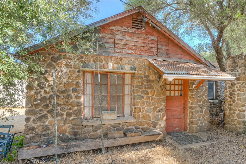 16 Rocky Drive Oroville, CA 95965 - Photo 48 of 61 a view of a brick house with many windows
