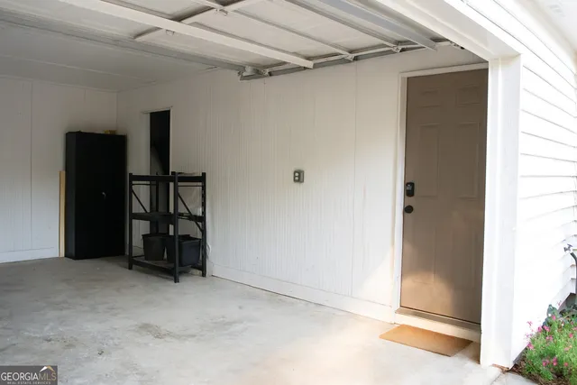 a view of a bathroom with sink and mirror
