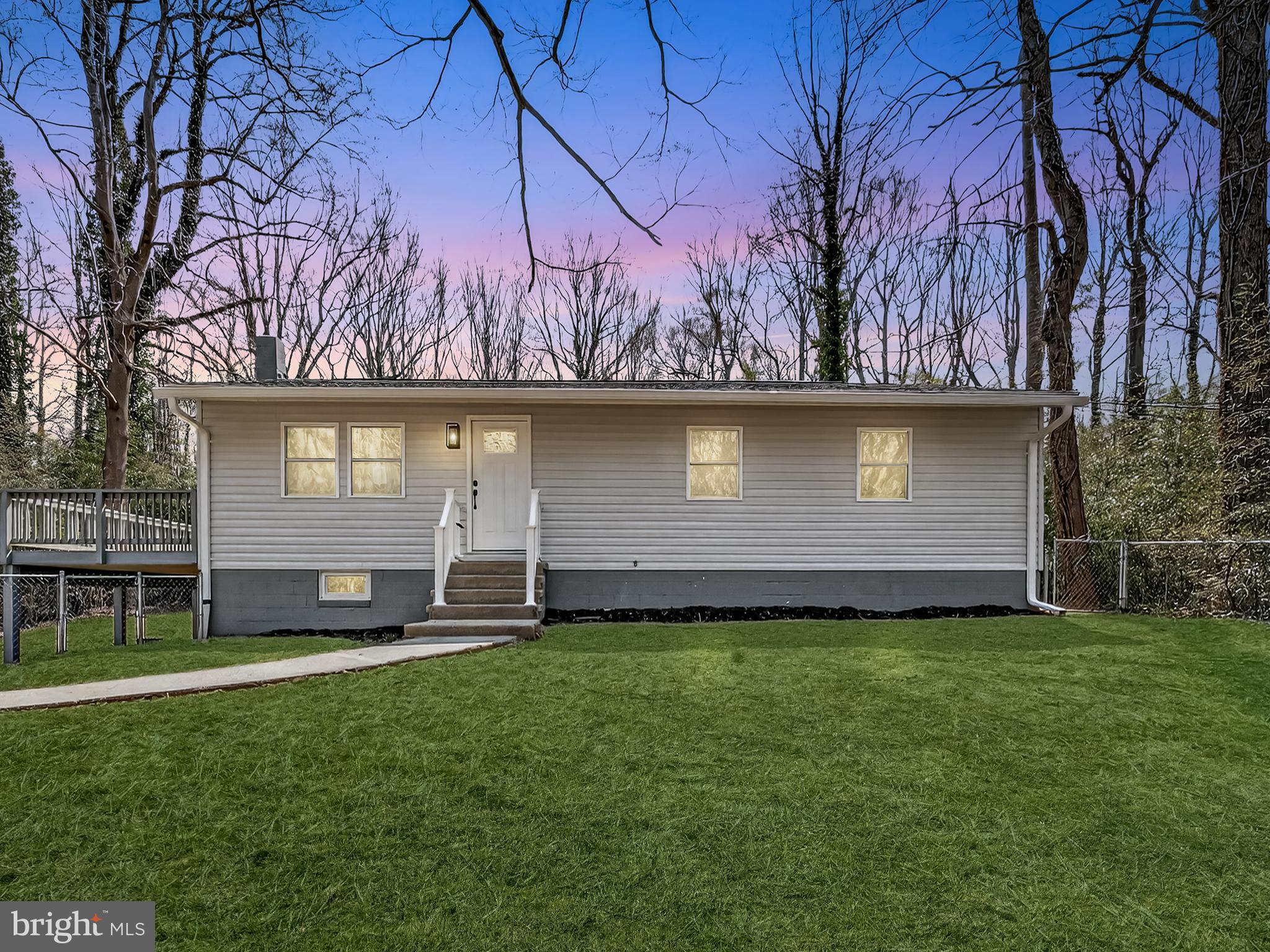 4475 Virginia Avenue Prince Frederick, MD 20678 - Photo 2 of 51 a front view of a house with garden