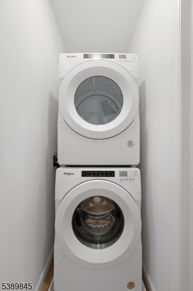 70 Ridgedale Avenue, Unit 310 Morristown, NJ 07960 - Photo 17 of 21 a utility room with dryer and washer