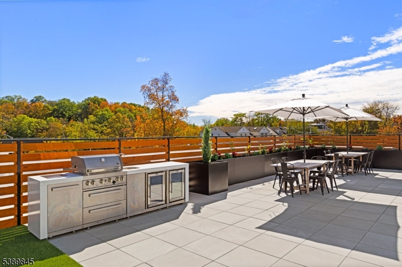 70 Ridgedale Avenue, Unit 310 Morristown, NJ 07960 - Photo 20 of 21 a view of a terrace with furniture and outdoor space