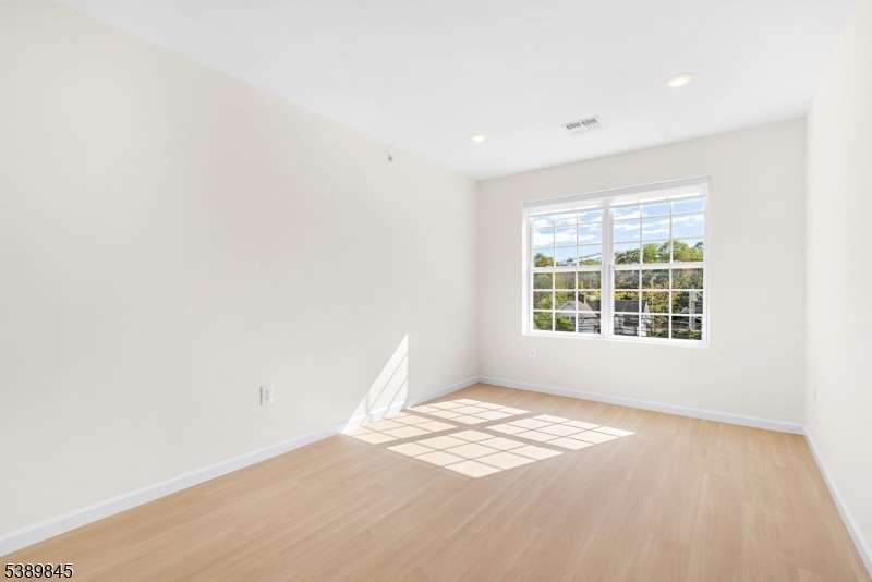 70 Ridgedale Avenue, Unit 310 Morristown, NJ 07960 - Photo 6 of 21 a view of a big room with windows