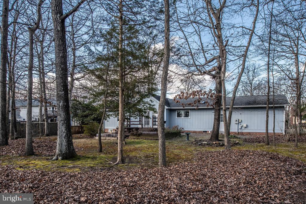 3915 Doran Road Fredericksburg, VA 22407 - Photo 22 of 57 a view of a house with a yard and trees
