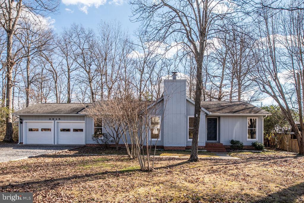 3915 Doran Road Fredericksburg, VA 22407 - Photo 3 of 57 a view of a house with a yard covered with snow