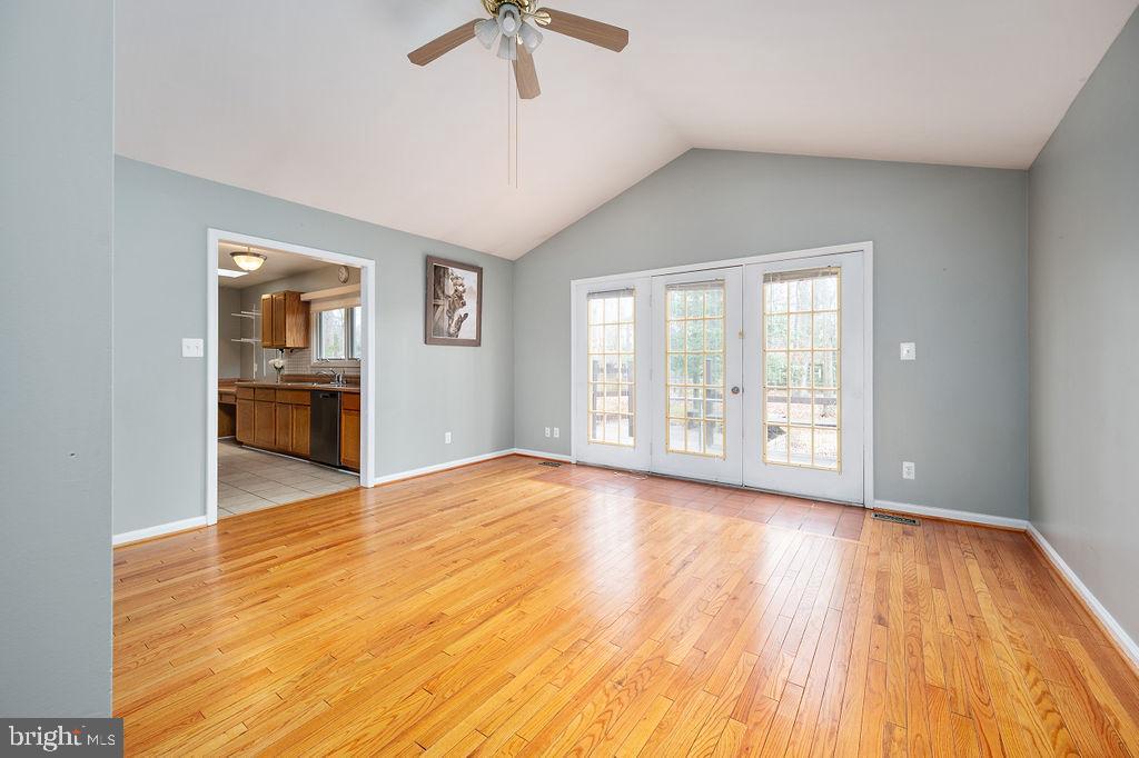 3915 Doran Road Fredericksburg, VA 22407 - Photo 40 of 57 an empty room with wooden floor and windows