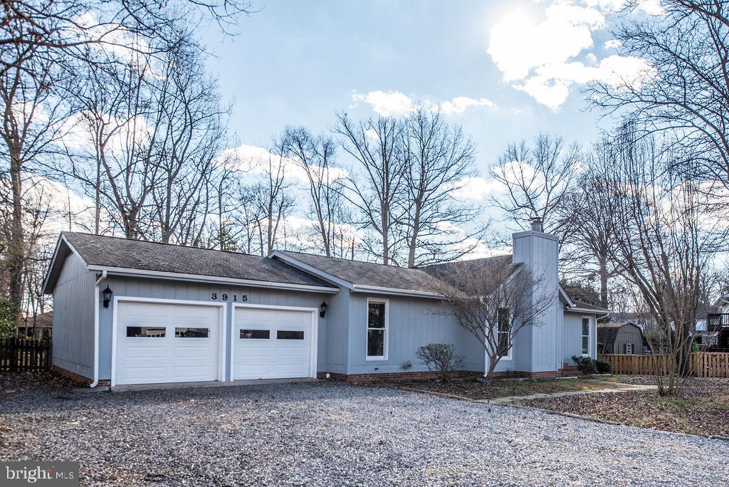 3915 Doran Road Fredericksburg, VA 22407 - Photo 4 of 57 a view of a house with a large tree and a big yard