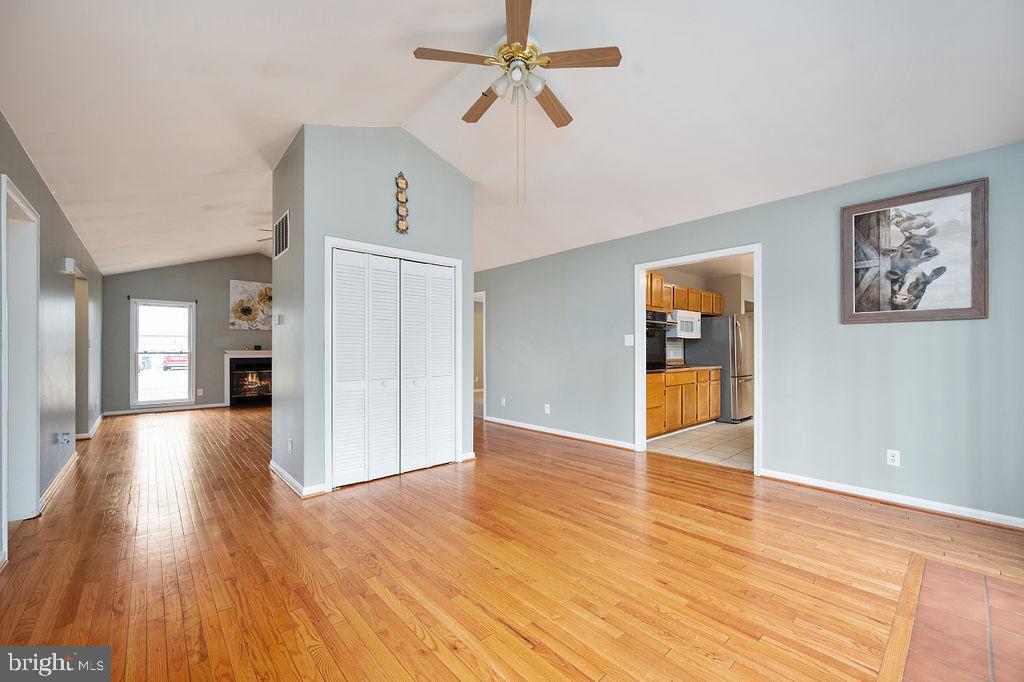 3915 Doran Road Fredericksburg, VA 22407 - Photo 42 of 57 a view of a livingroom with wooden floor and a ceiling fan