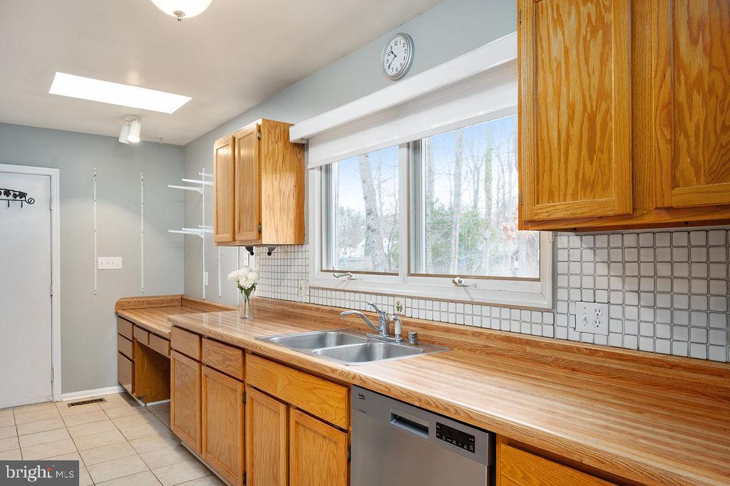 3915 Doran Road Fredericksburg, VA 22407 - Photo 46 of 57 a kitchen with a sink and a window