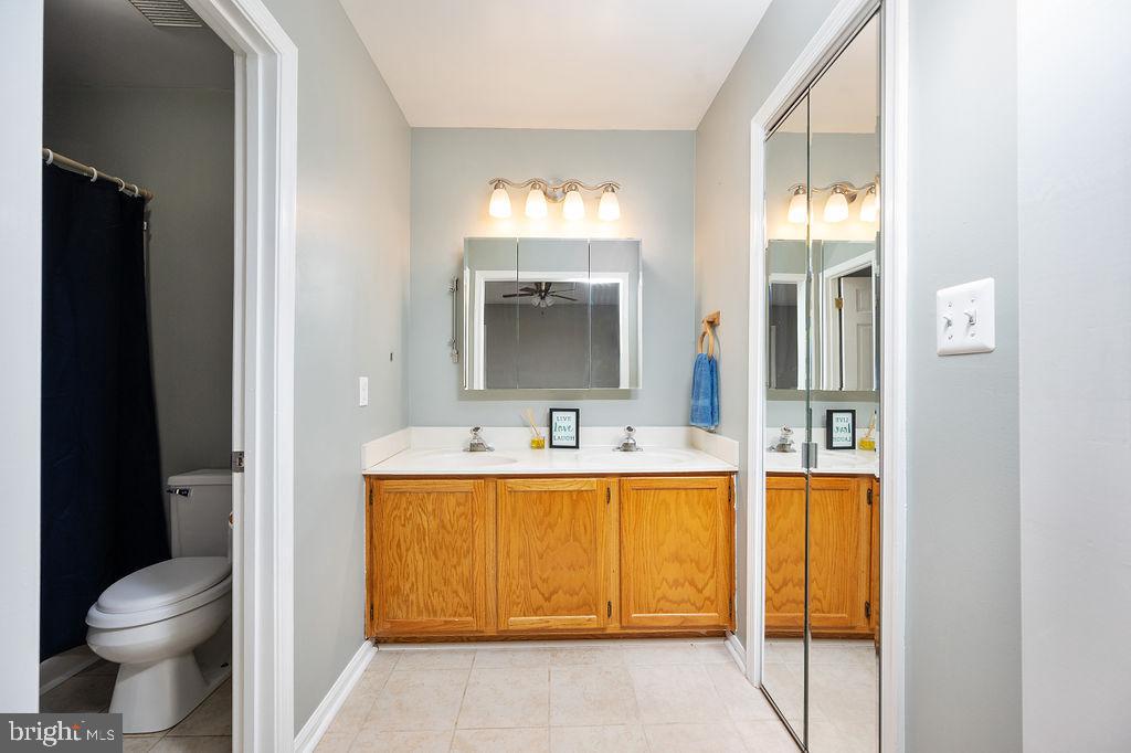 3915 Doran Road Fredericksburg, VA 22407 - Photo 55 of 57 a bathroom with a sink and a mirror