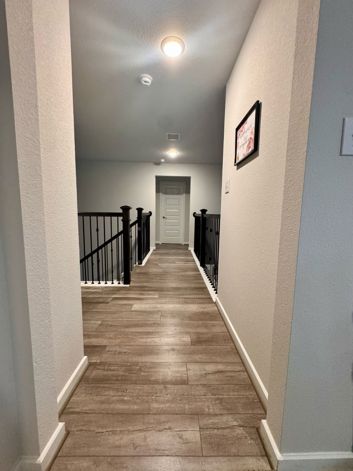 15814 Weston Ridge Drive Humble, TX 77346 - Photo 13 of 43 Hallway that separates the rooms and allows access to the game room.