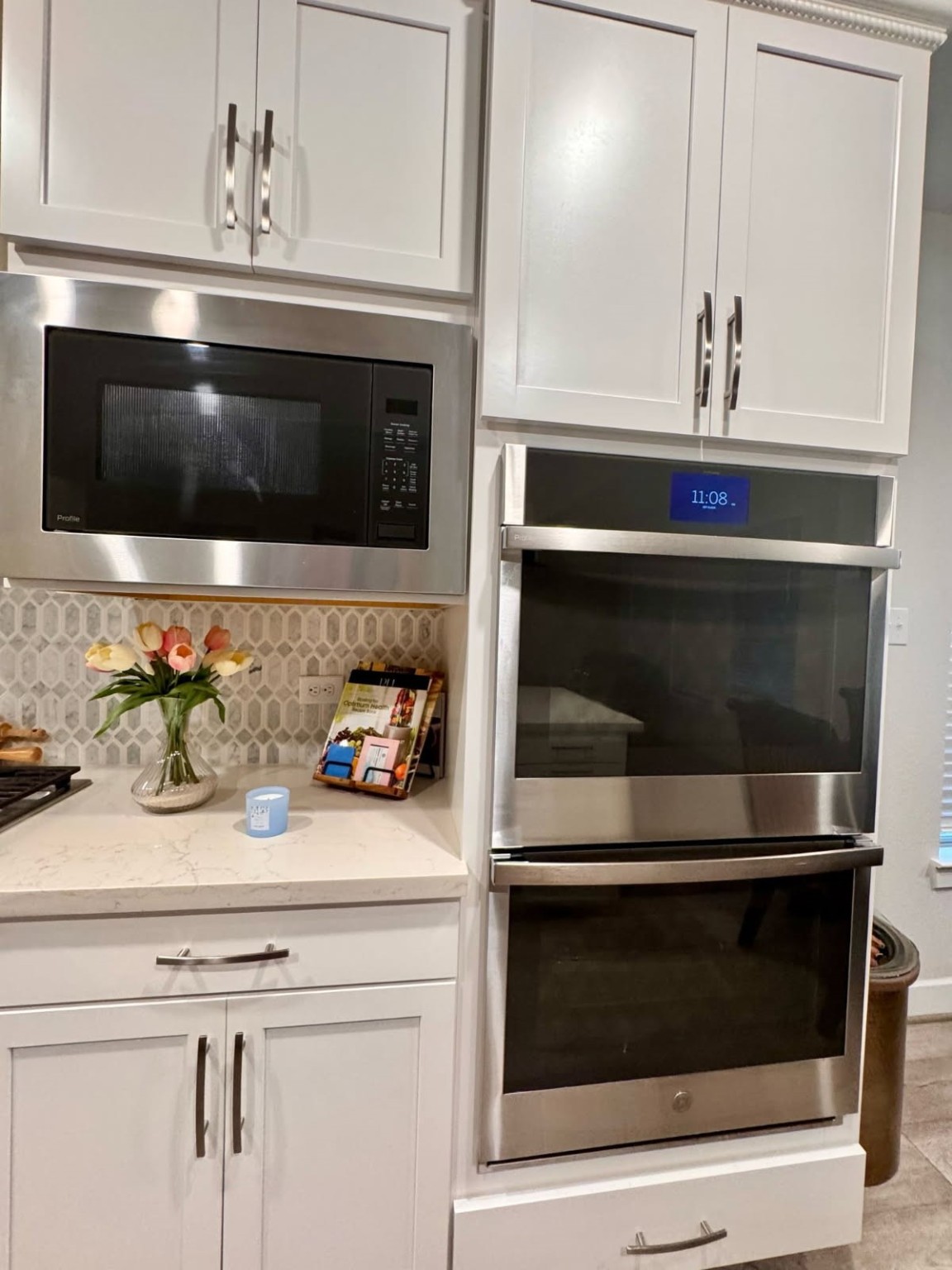 15814 Weston Ridge Drive Humble, TX 77346 - Photo 19 of 43 a kitchen with granite countertop white cabinets appliances and a sink