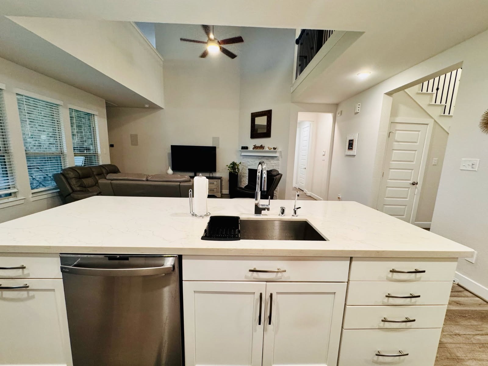 15814 Weston Ridge Drive Humble, TX 77346 - Photo 20 of 43 a kitchen with a sink a counter top space and a refrigerator