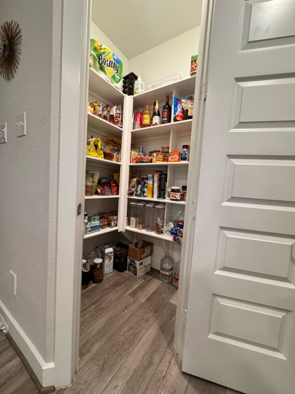 15814 Weston Ridge Drive Humble, TX 77346 - Photo 30 of 43 a view of walk in closet with clothes and shoes