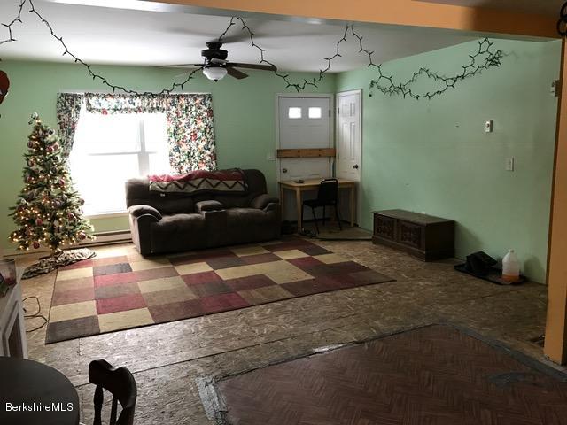 397 Chapel Road Savoy, MA 01256 - Photo 3 of 16 living room open to kitchen