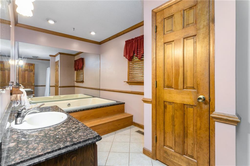 7763 Alcorn Road Oak Ridge, NC 27310 - Photo 22 of 32
