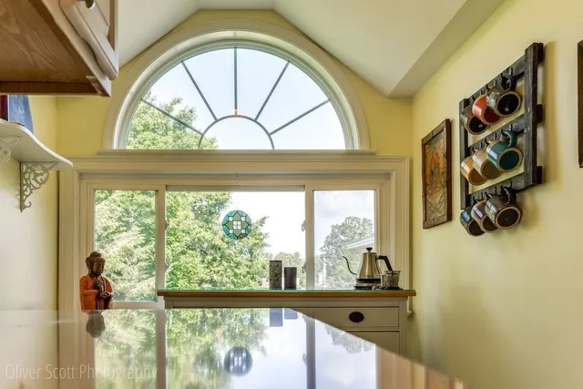 a view of an entryway with a door