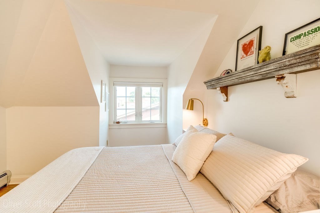30 Graves Avenue, Unit B Northampton, MA 01060 - Photo 24 of 41 a bedroom with a bed and a window