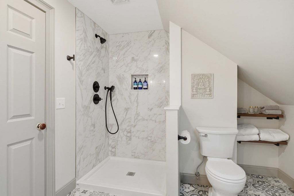 30 Graves Avenue, Unit B Northampton, MA 01060 - Photo 27 of 41 a bathroom with a shower and a toilet