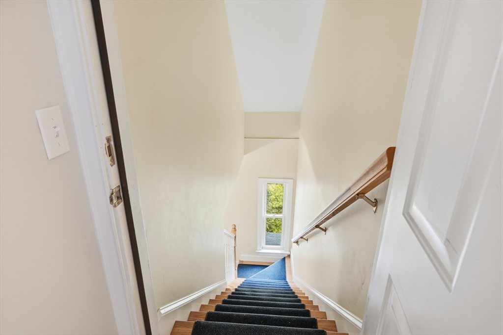 30 Graves Avenue, Unit B Northampton, MA 01060 - Photo 39 of 41 a view of staircase with wooden floor and white walls