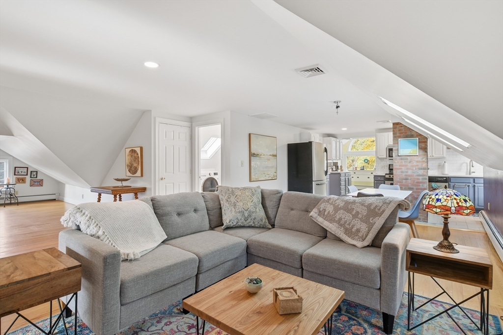 30 Graves Avenue, Unit B Northampton, MA 01060 - Photo 9 of 41 a living room with furniture and a large window