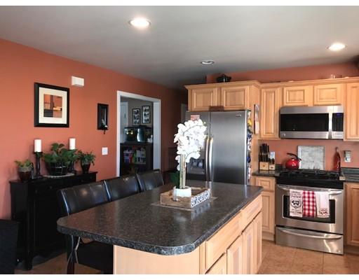 35 Wyndham Court Fall River, MA 02721 - Photo 11 of 14 a kitchen with counter space cabinets and appliances