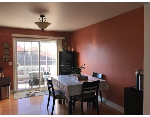 35 Wyndham Court Fall River, MA 02721 - Photo 12 of 14 a view of a dining room with furniture window and wooden floor