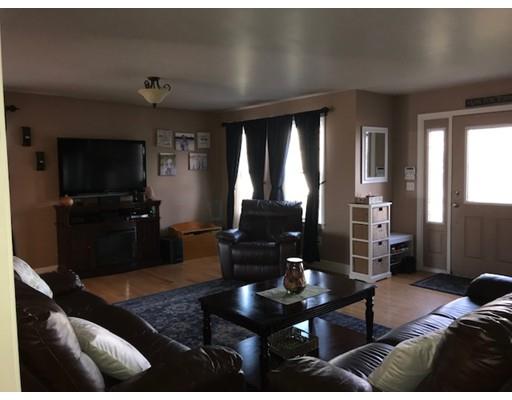 35 Wyndham Court Fall River, MA 02721 - Photo 7 of 14 a living room with furniture and a flat screen tv