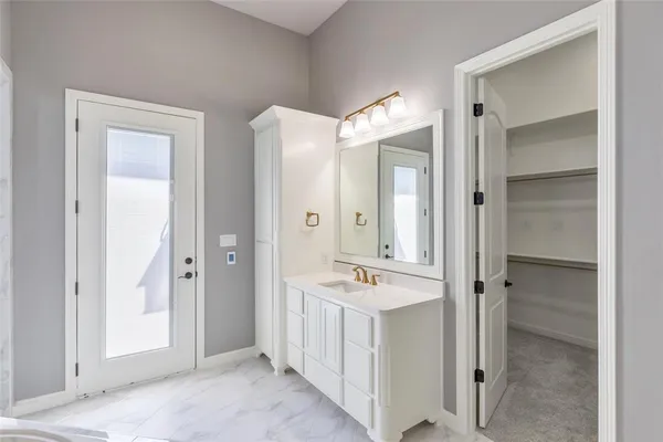 a view of cabinets and window