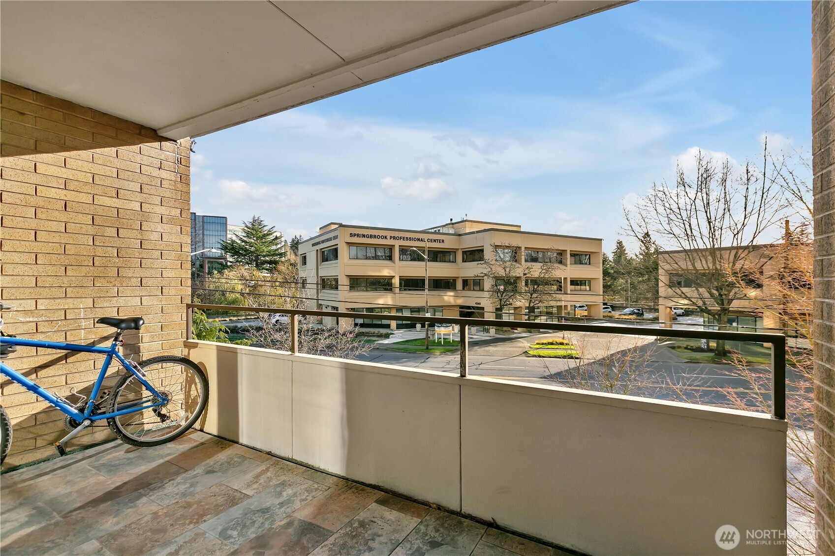 4545 Sand Point Way Northeast, Unit 207 Seattle, WA 98105 - Photo 23 of 25 a view of a balcony with chairs