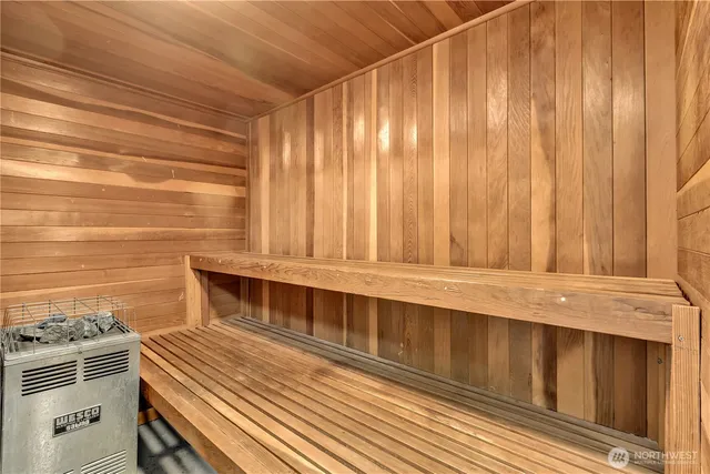 a kitchen with wooden floor and a sink