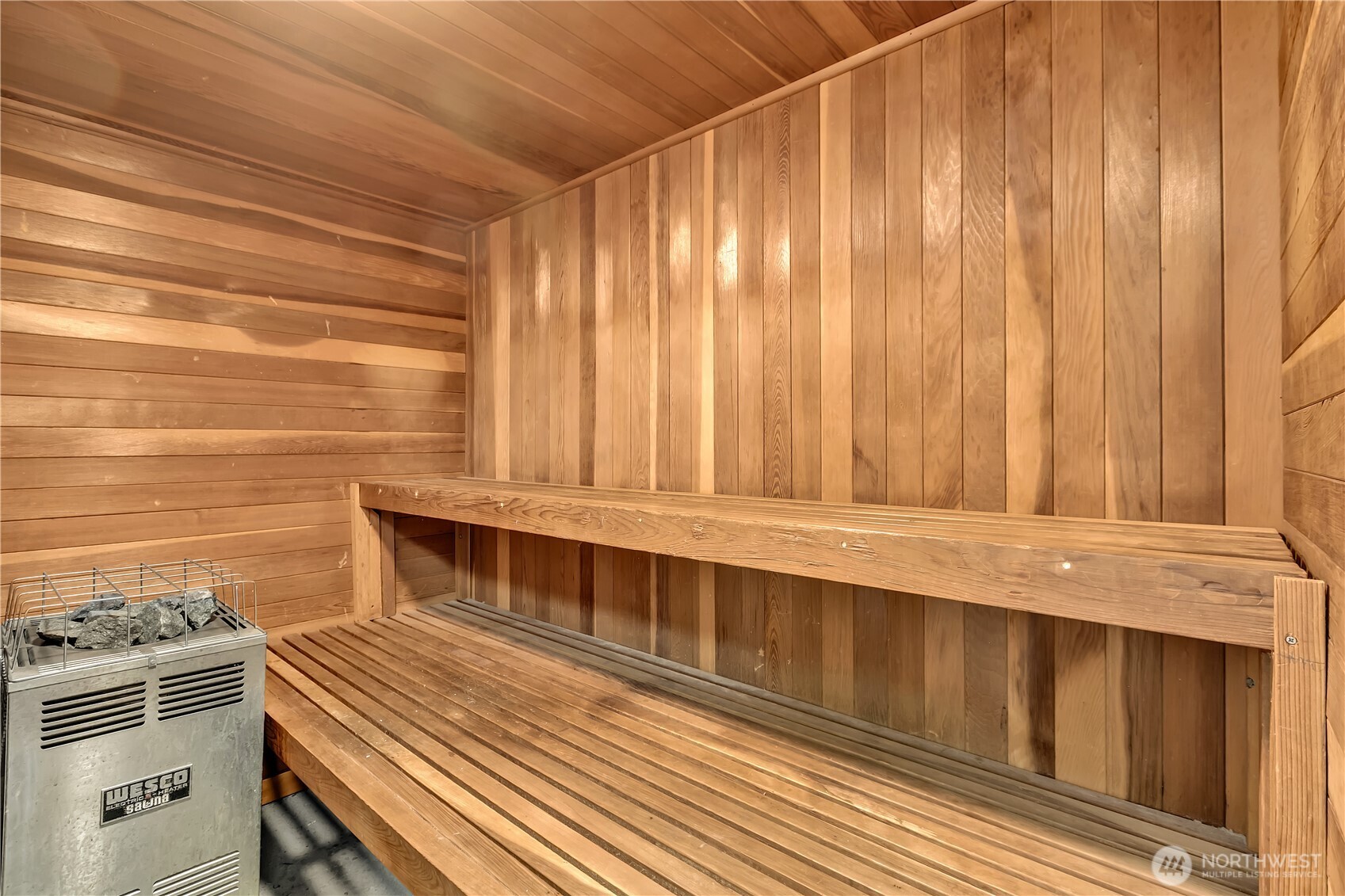 4545 Sand Point Way Northeast, Unit 207 Seattle, WA 98105 - Photo 24 of 25 a kitchen with wooden floor and a sink