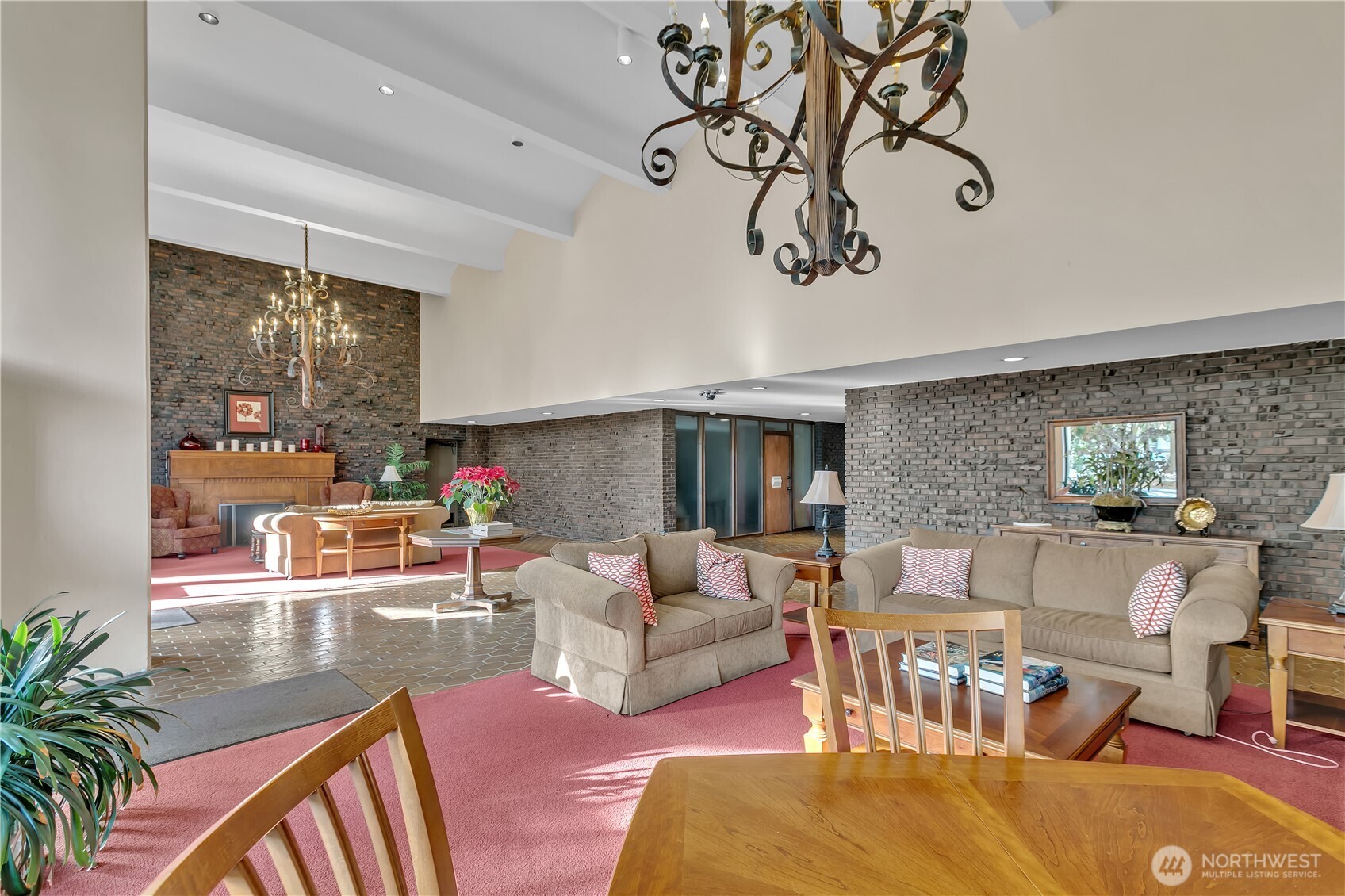 4545 Sand Point Way Northeast, Unit 207 Seattle, WA 98105 - Photo 3 of 25 a living room with furniture or couch and a dining table