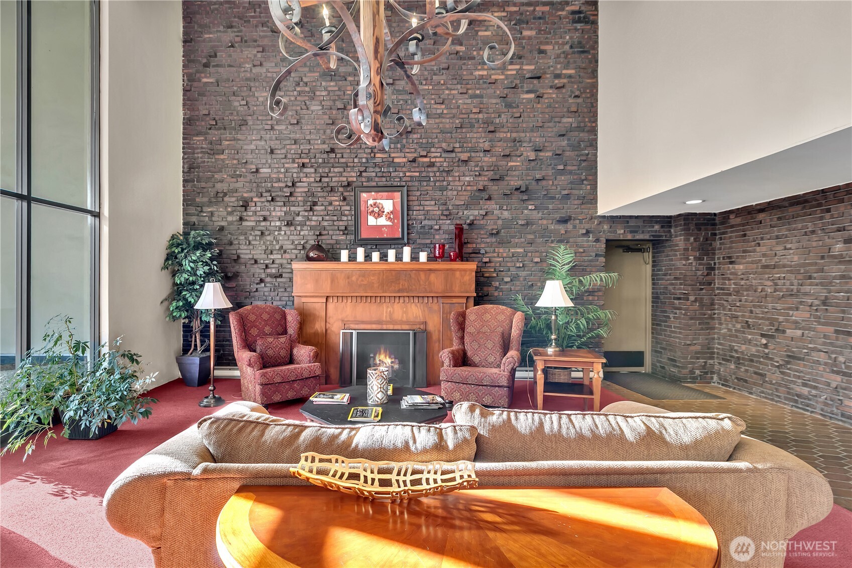 4545 Sand Point Way Northeast, Unit 207 Seattle, WA 98105 - Photo 4 of 25 a living room with furniture and a fireplace
