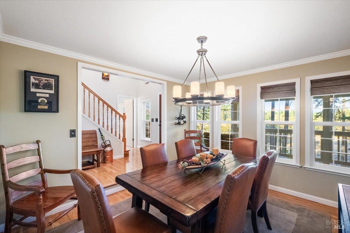 5701 Ridgewood Road Willits, CA 95490 - Photo 21 of 84 a view of a dining room with furniture window and wooden floor