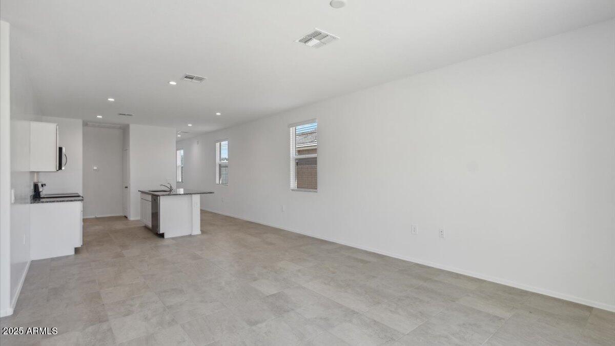 2117 Simone Avenue Apache Junction, AZ 85120 - Photo 7 of 16 Caroline kitchen and great room