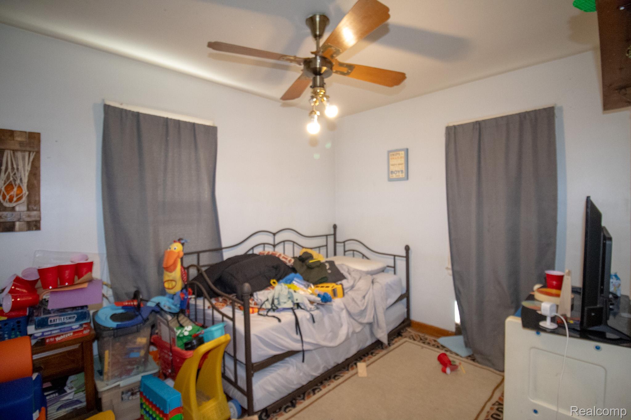 8080 Wayne Road Romulus, MI 48174 - Photo 10 of 28 Bedroom featuring a ceiling fan