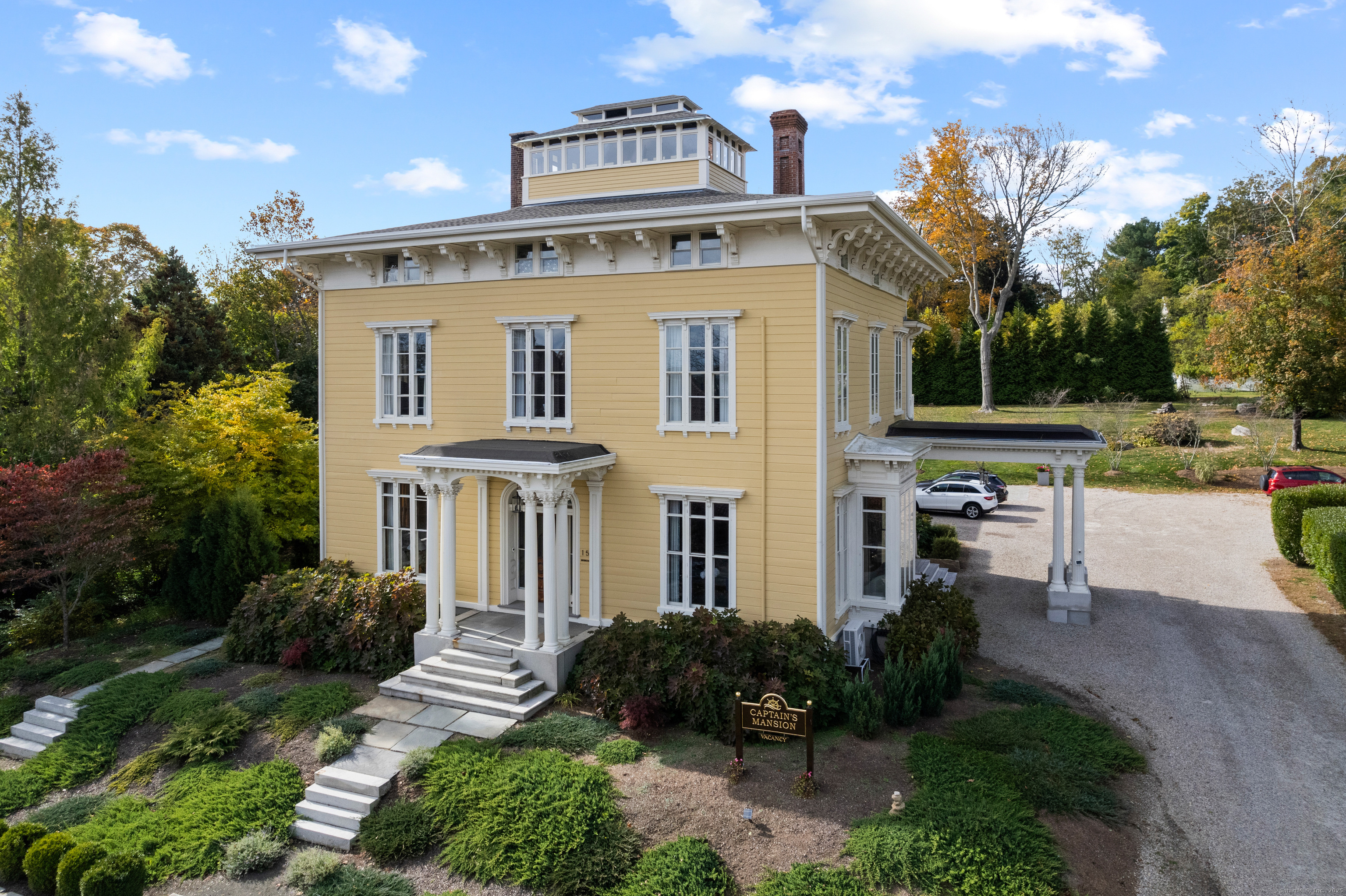 8 Bedrooms with 8 Full and 3 Half Baths nestled on 1.5 manicured acres steps from Historic Downtown Mystic.