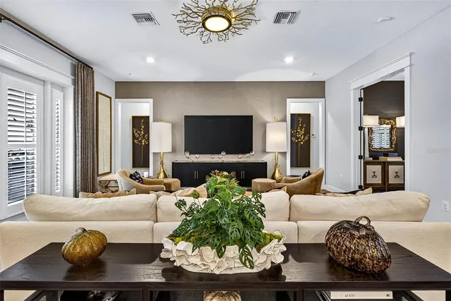 a bedroom with bed and a window