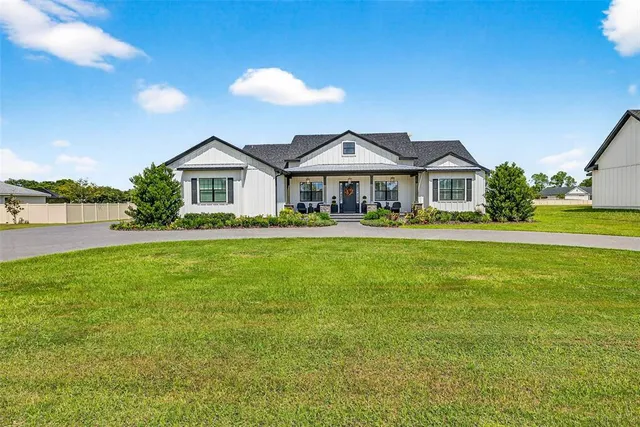 a front view of a house with a porch