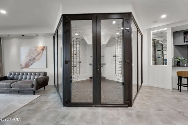 an aerial view of residential houses with outdoor space and river