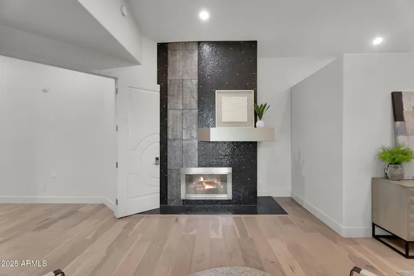 an aerial view of a house with a garden and trees