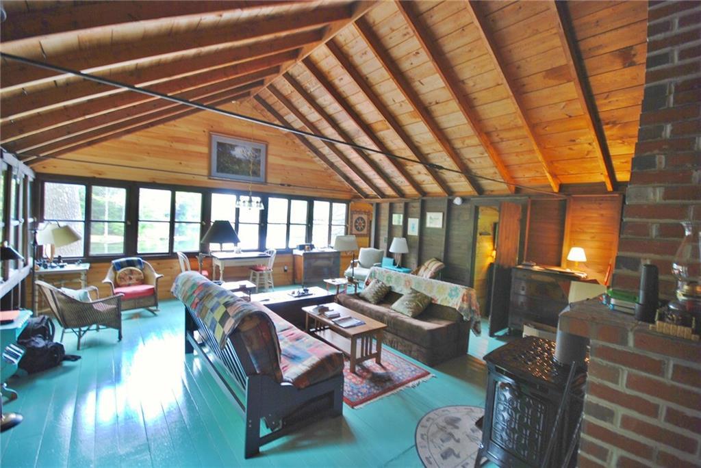 21 Coffee Pond Road Casco, ME 04015 - Photo 9 of 27 Adirondack style has been maintained...