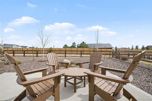 a view of a terrace with seating area